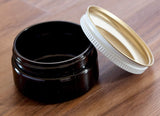 Plastic Low Profile Jar in Black with White Metal Plastisol Lid - 2 oz / 60 ml