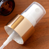 Clear Plastic PET Boston Round Bottle with Gold Fine Mist Sprayer (12 Pack)