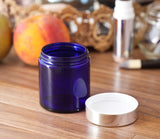 2 oz Cobalt Blue Thick Glass Straight Sided Jar with Silver Metal Overshell Lid (12 Pack)
