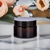 (12 Pack) 1 oz Amber Glass Thick Wall Balm Jars with Black Lids