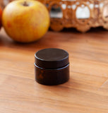 (12 Pack) 1 oz Amber Glass Thick Wall Balm Jars with Black Lids