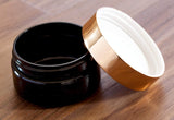 Plastic Low Profile Jar in Black with Gold Metal Overshell Lid - 2 oz / 60 ml