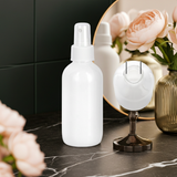 (12 Pack) 4 oz / 120 ml High Shine Gloss White Glass Boston Round Bottle with White Fine Mist Spray - JUVITUS