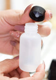Natural Clear Plastic Squeeze LDPE Bottle with Black Phenolic Cap - 1 oz / 30 ml