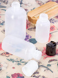 Natural Clear Plastic Squeeze LDPE Bottle with Black Disc Cap - 2 oz / 60 ml