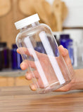 Clear Plastic Wide Mouth Packer Bottle with Child Resistant White Push and Turn Lid - 32 oz / 950