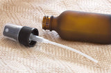Frosted Amber Glass Boston Round Fine Mist Spray Bottle with Black Sprayer - 2 oz / 60 ml