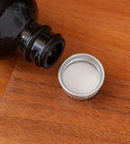 2 oz Black Glass Luxury Boston Round Bottle with Silver Metal Screw On Caps