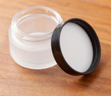 1 oz / 30 ml Frosted Clear Glass Heavy Thick Wall Balm Jars with Black Smooth Foam Lids (12 Pack)