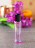 (12 Pack) 2 oz Pink Cosmo Round PET Plastic Bottle with Black Disc Cap