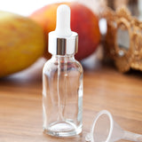 1 oz / 30 ml Clear Glass Boston Round Bottle with Silver Metal and Glass Dropper